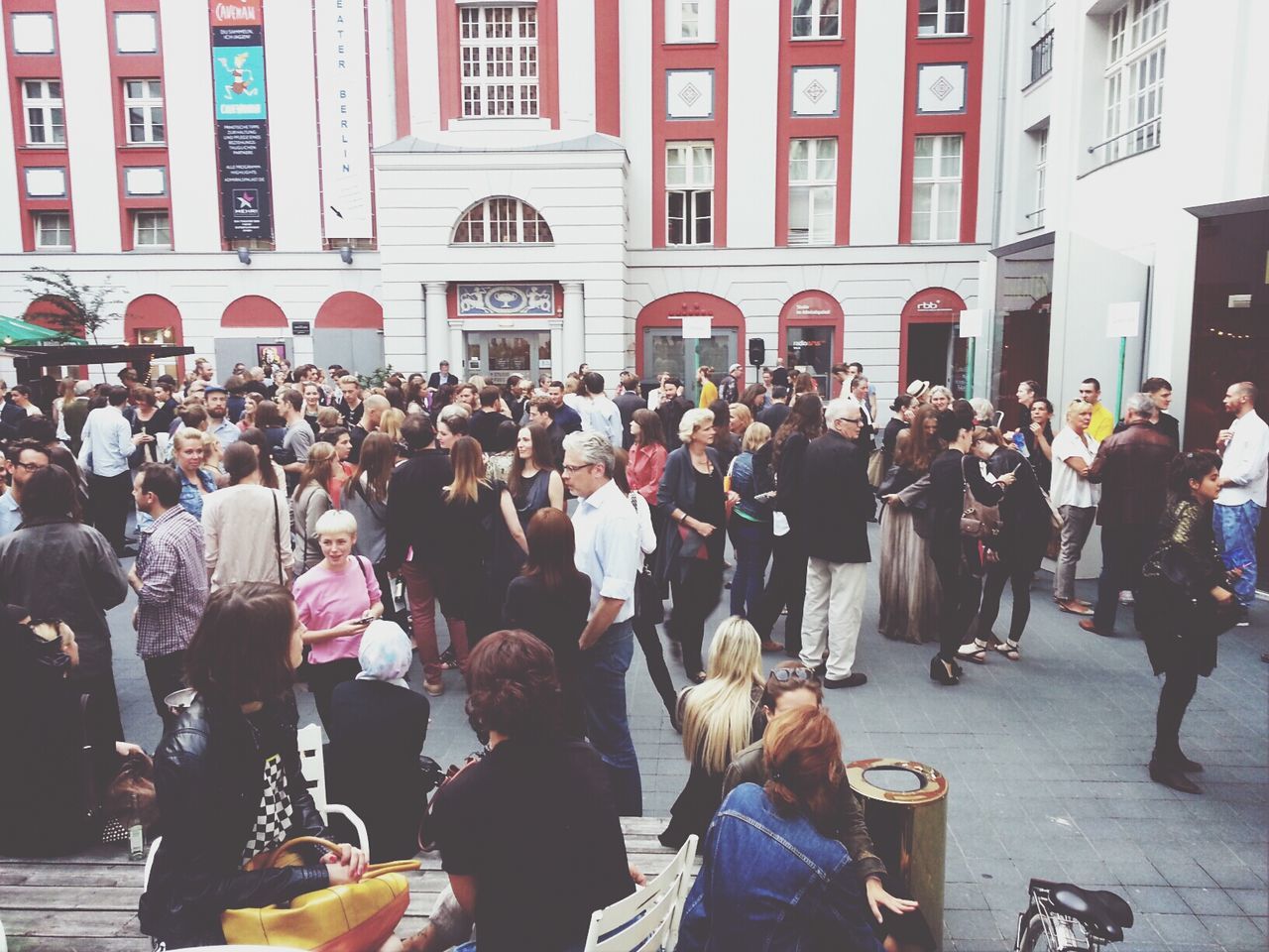 large group of people, building exterior, architecture, built structure, men, person, lifestyles, crowd, city, street, leisure activity, city life, walking, mixed age range, building, city street, casual clothing, day, outdoors