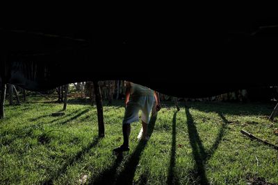 Shadow of man on field