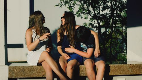 Friends sitting outdoors