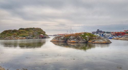 Scenic view of bay against sky