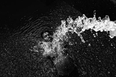 Portrait of man swimming in sea