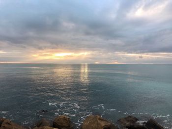 Scenic view of sea against sky during sunset