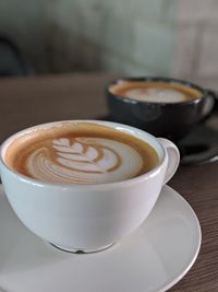 Close-up of cappuccino on table