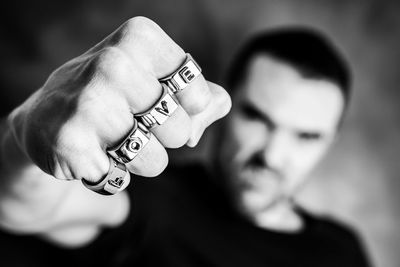 Close-up of man holding hands