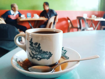 Coffee cup on table