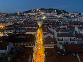 High angle view of illuminated buildings in city