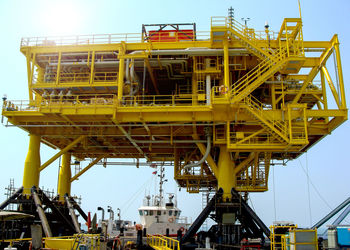 Low angle view of construction site against sky