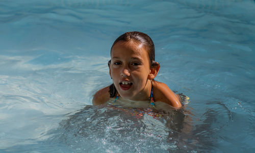 Portrait of girl in swimming pool