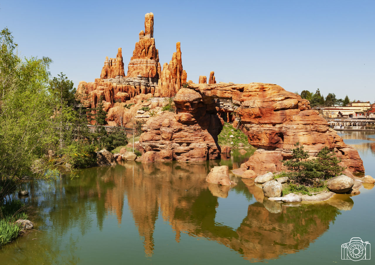 sky, water, architecture, travel, nature, plant, travel destinations, reflection, clear sky, solid, lake, day, tourism, rock - object, rock, built structure, waterfront, no people, history