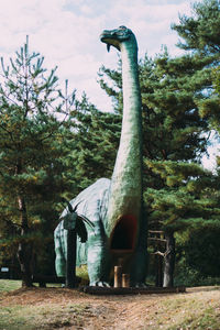 View of statue against trees