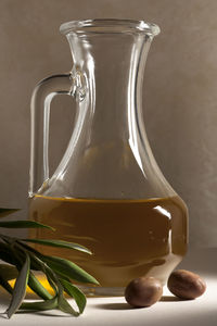 Close-up of glass jar on table