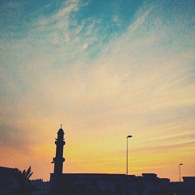 sunset, architecture, built structure, building exterior, sky, cloud - sky, low angle view, silhouette, orange color, cloud, cloudy, beauty in nature, high section, nature, outdoors, dramatic sky, scenics, no people, house, building