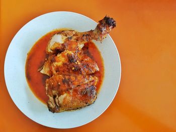 Directly above shot of cooked meat served on table