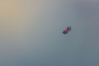 High angle view of people on boat in sea