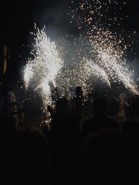Firework display at night