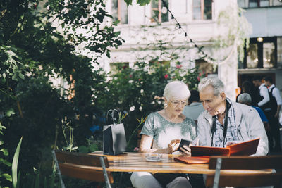 People sitting on table at cafe