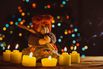 Illuminated christmas lights on table