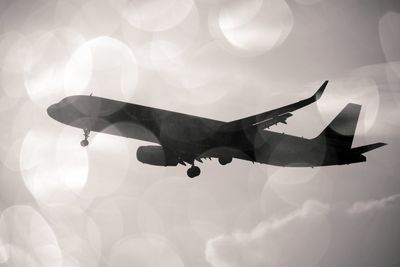 Airbus silhouette through rain drops