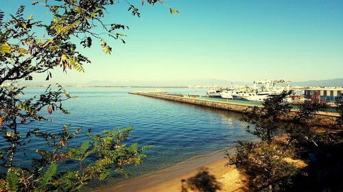Scenic view of sea against clear blue sky