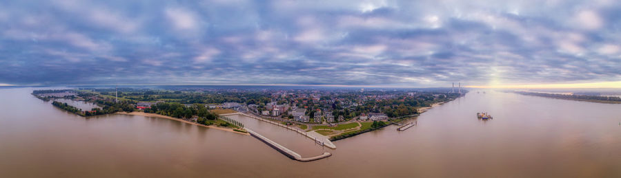 Panoramic view of cityscape against sky
