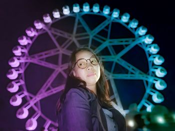 Portrait of a smiling woman in amusement park