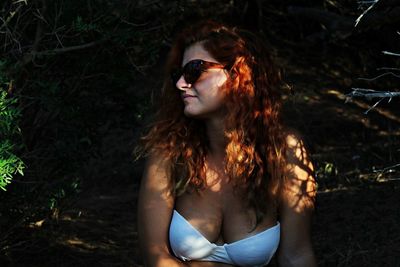 Beautiful young woman in sunglasses