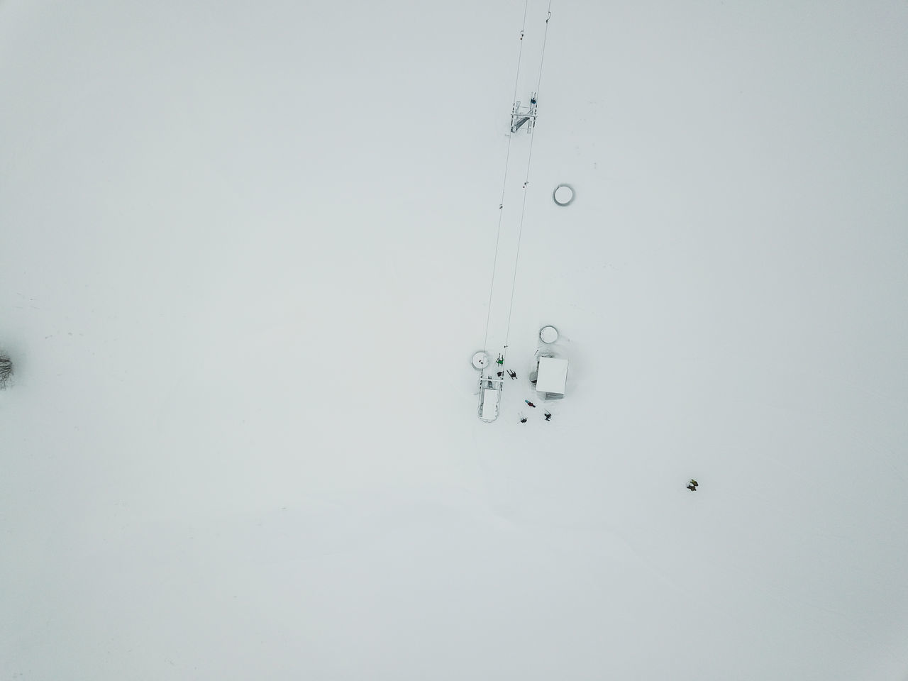 LOW ANGLE VIEW OF POWER LINES IN SNOW