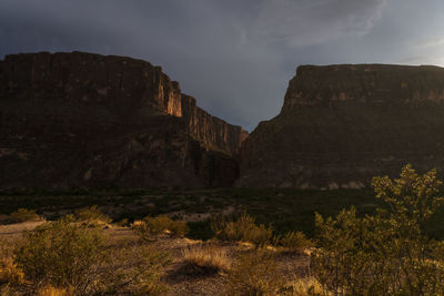 Scenic view of rocky mountains against sky