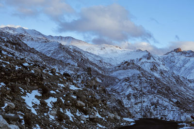 Scenic view of snowcapped mountains against sky