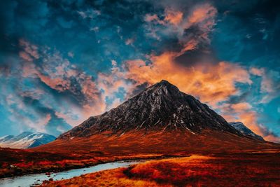 Scenic view of dramatic sky over desert