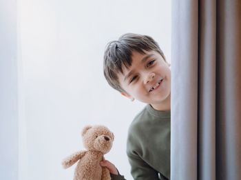 Cute girl with stuffed toy