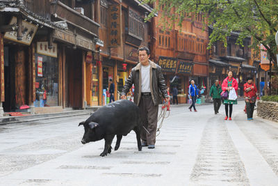 Men walking in city