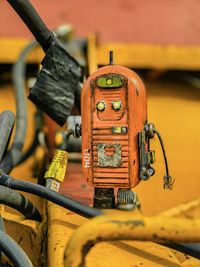 Close-up of yellow robot machine 