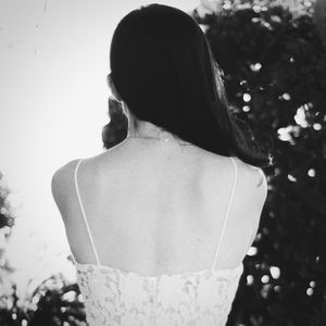 Close-up of woman standing in pond