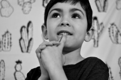 Close-up portrait of boy at home