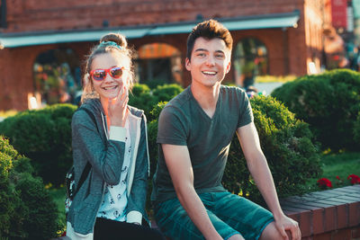 Portrait of smiling young woman outdoors