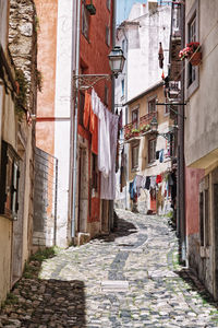 Alley amidst buildings in town