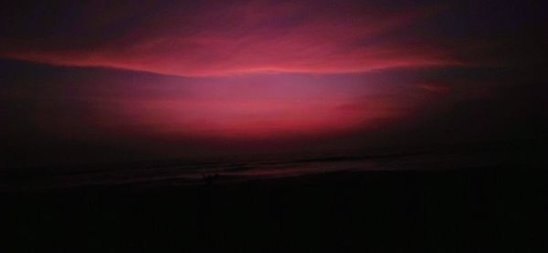 Low angle view of dramatic sky at sunset