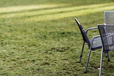 Empty chairs in park