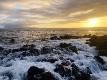 Scenic view of sea against sky during sunset