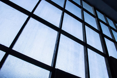 Low angle view of skylight in building