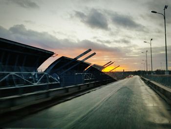 View of road against cloudy sky