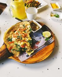 High angle view of breakfast served on table