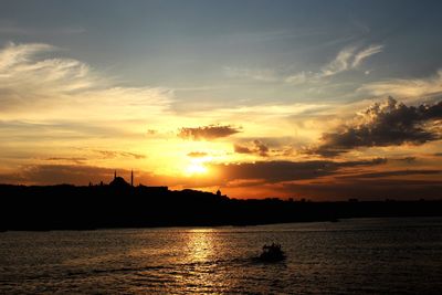 Scenic view of sea against sky during sunset