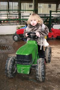 Portrait of girl on tractor