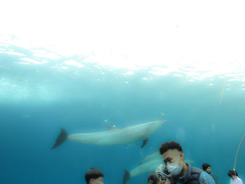 People swimming in sea