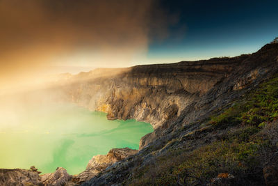 Scenic view of volcanic landscape against sky