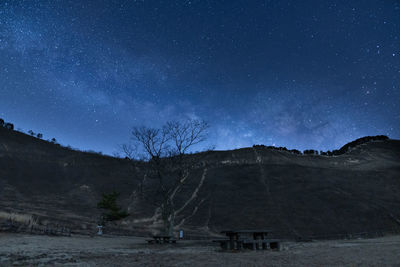 Scenic view of star field against sky at night