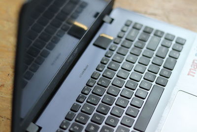 Close-up of computer keyboard on table