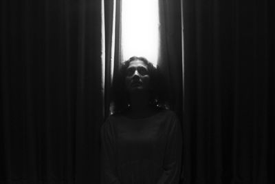 Mid adult man in darkroom